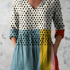 Multicolour long blouse with V-neck worn untucked