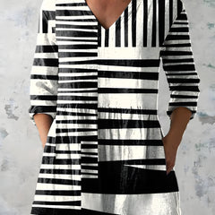 Sienna long blouse shown on model, relaxed flowing fit with long sleeves