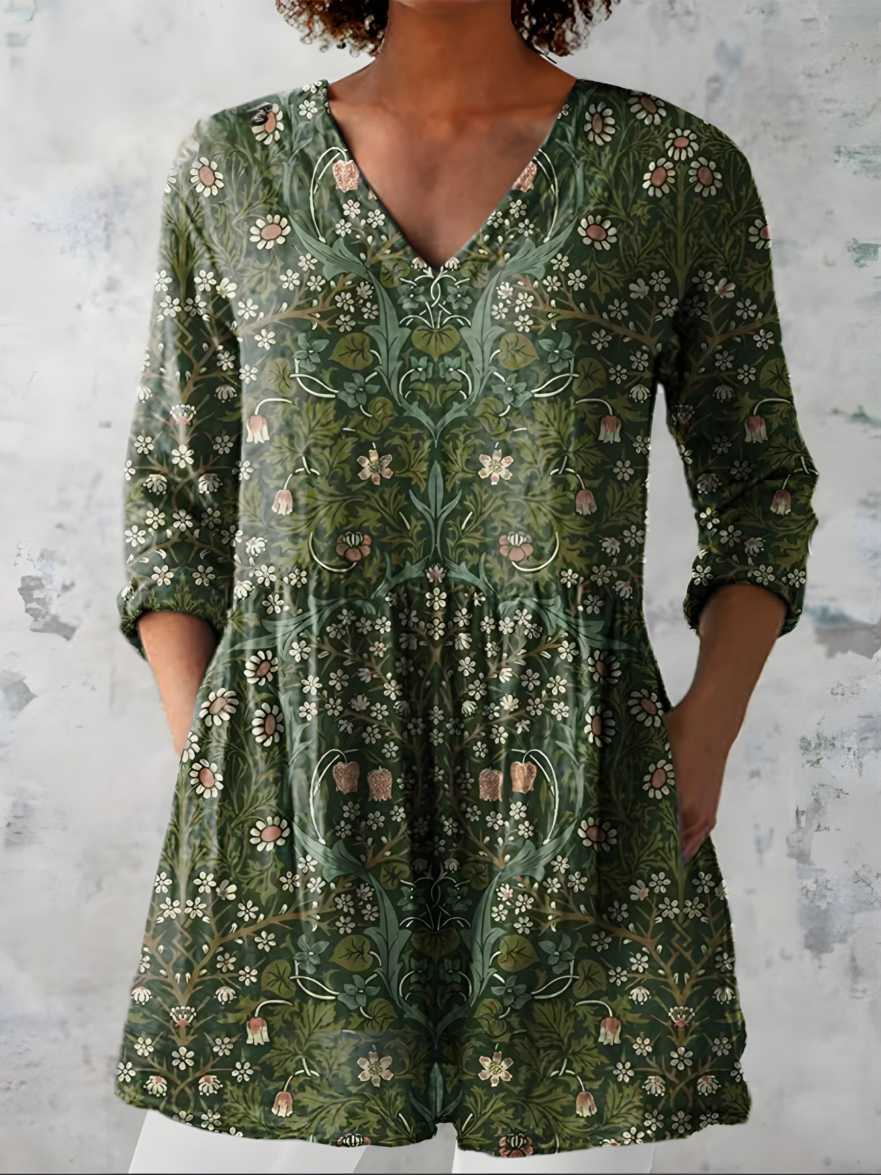 Model wearing the Cecelia green long blouse