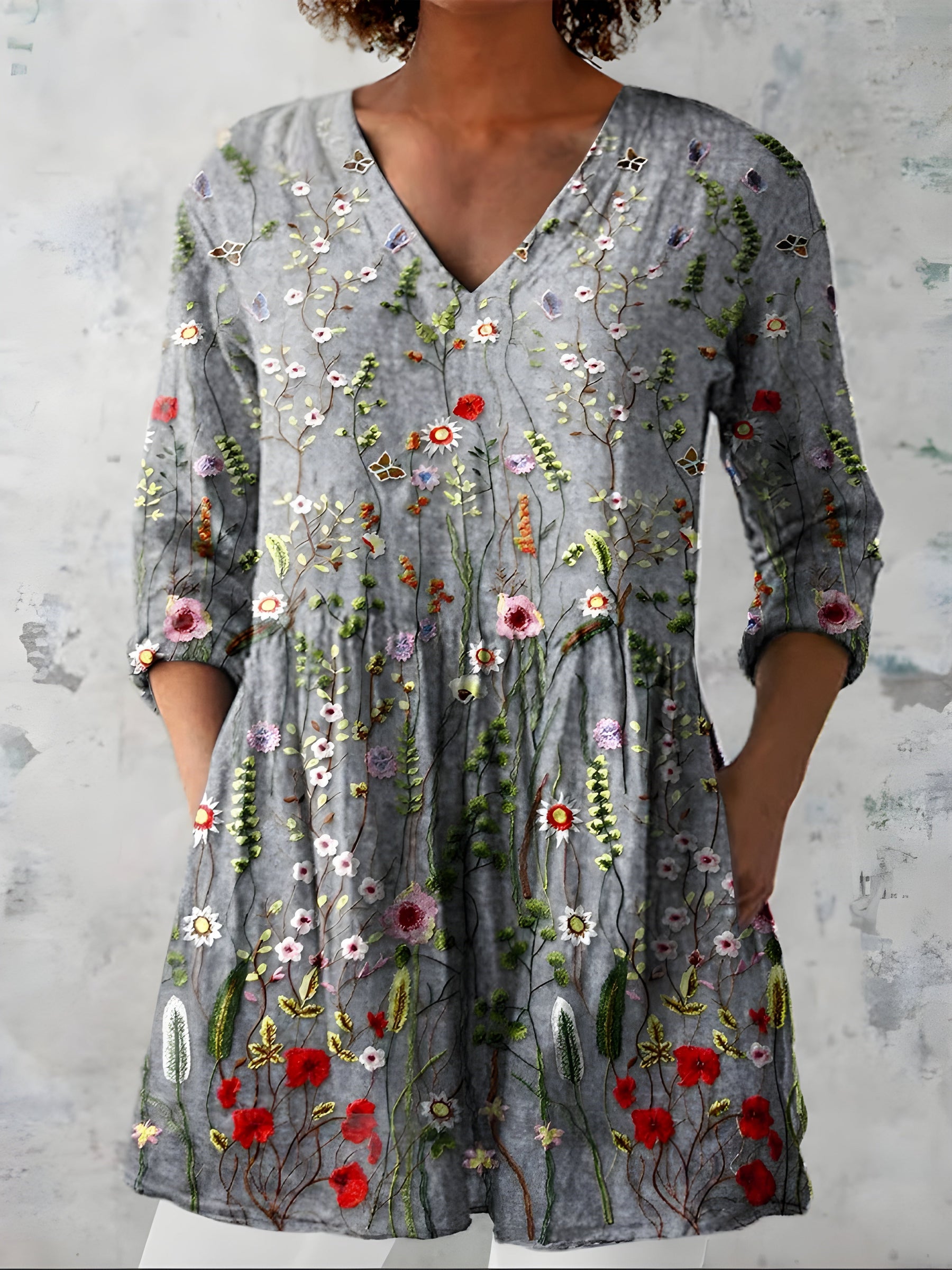 Audrey long blouse styled with a V-neckline