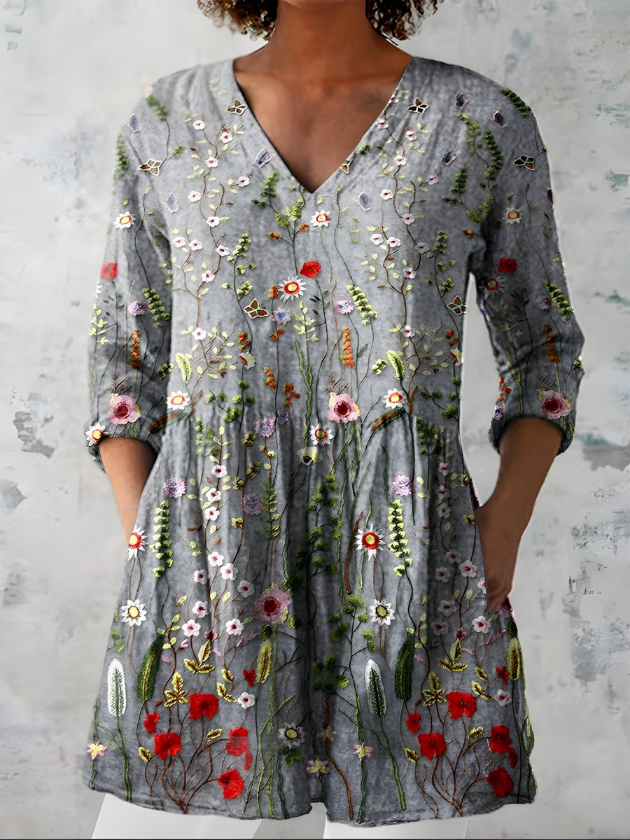 Audrey long blouse styled with a V-neckline