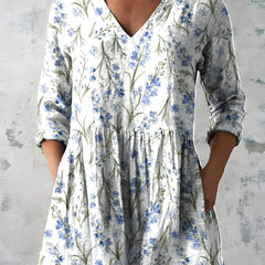 Lenora white long blouse showing the V-neckline
