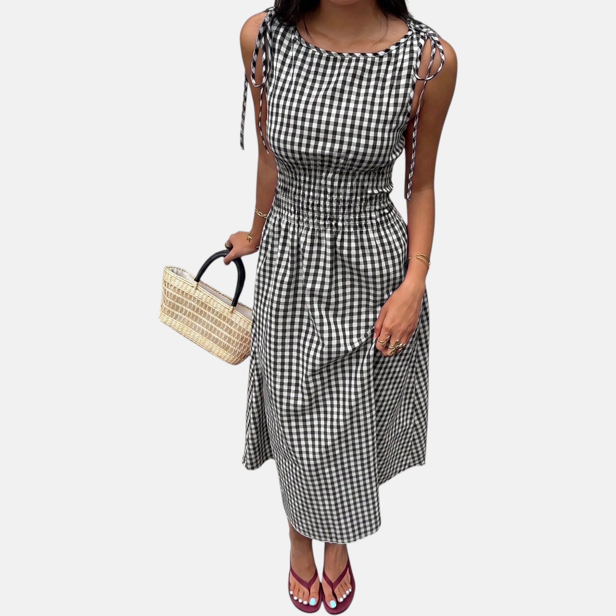 Woven midi dress laid flat showing the flared skirt
