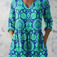 Model wearing the Marlee teal long blouse