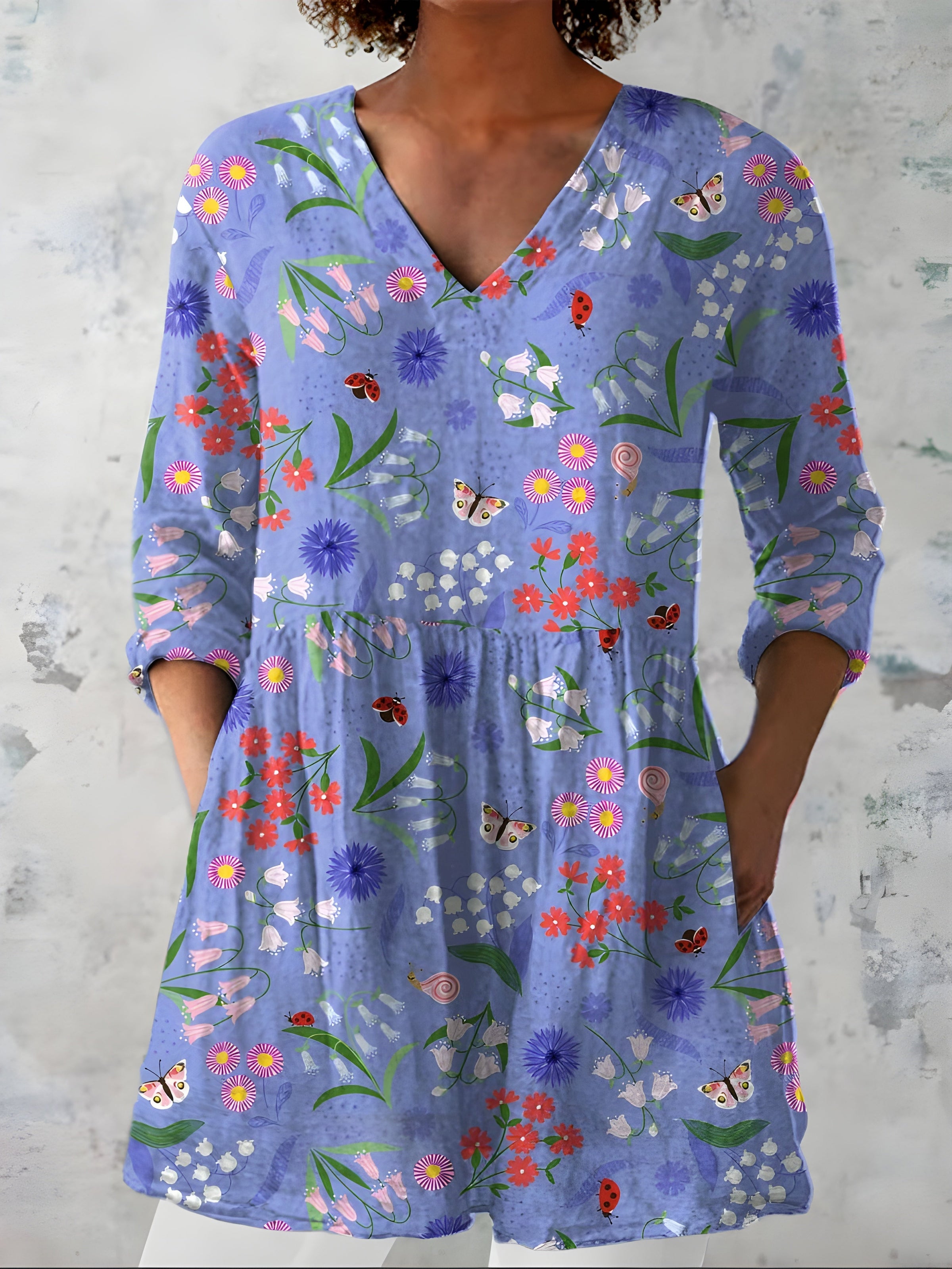Josie purple long blouse showing the V-neckline