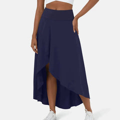 Asymmetric midi skirt styled with a tucked top