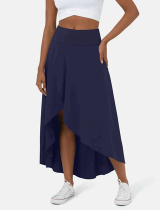 Asymmetric midi skirt styled with a tucked top