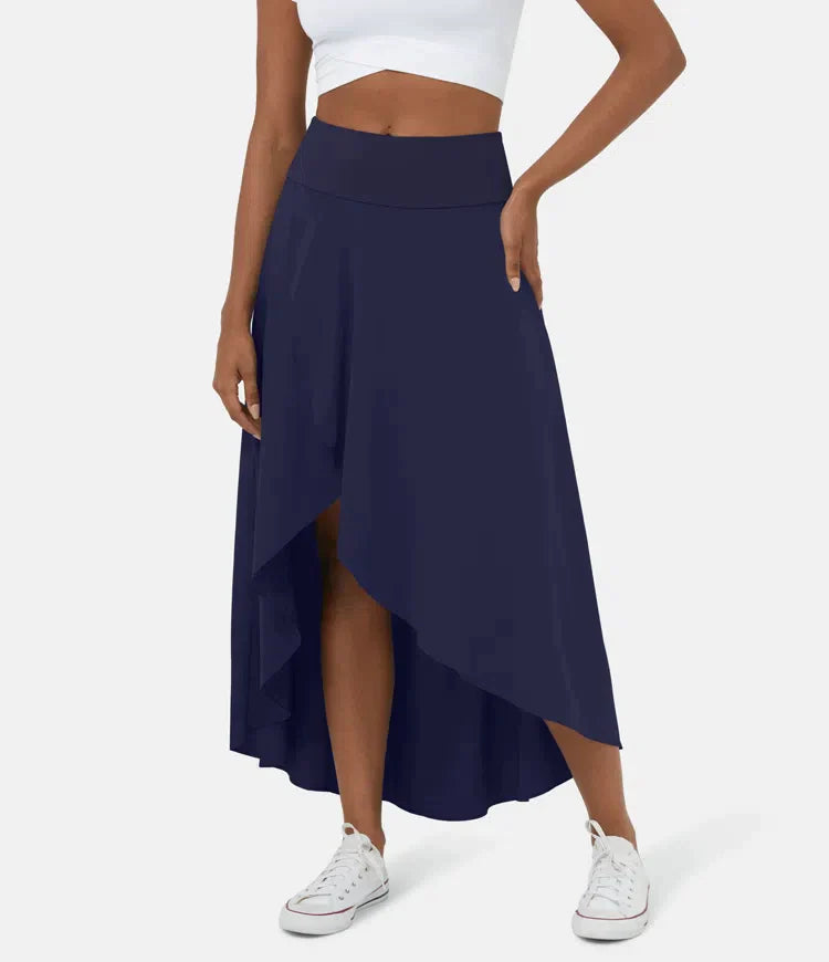 Asymmetric midi skirt styled with a tucked top