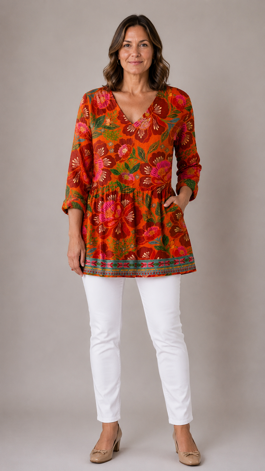 Red orange patterned long blouse with V-neck, front view