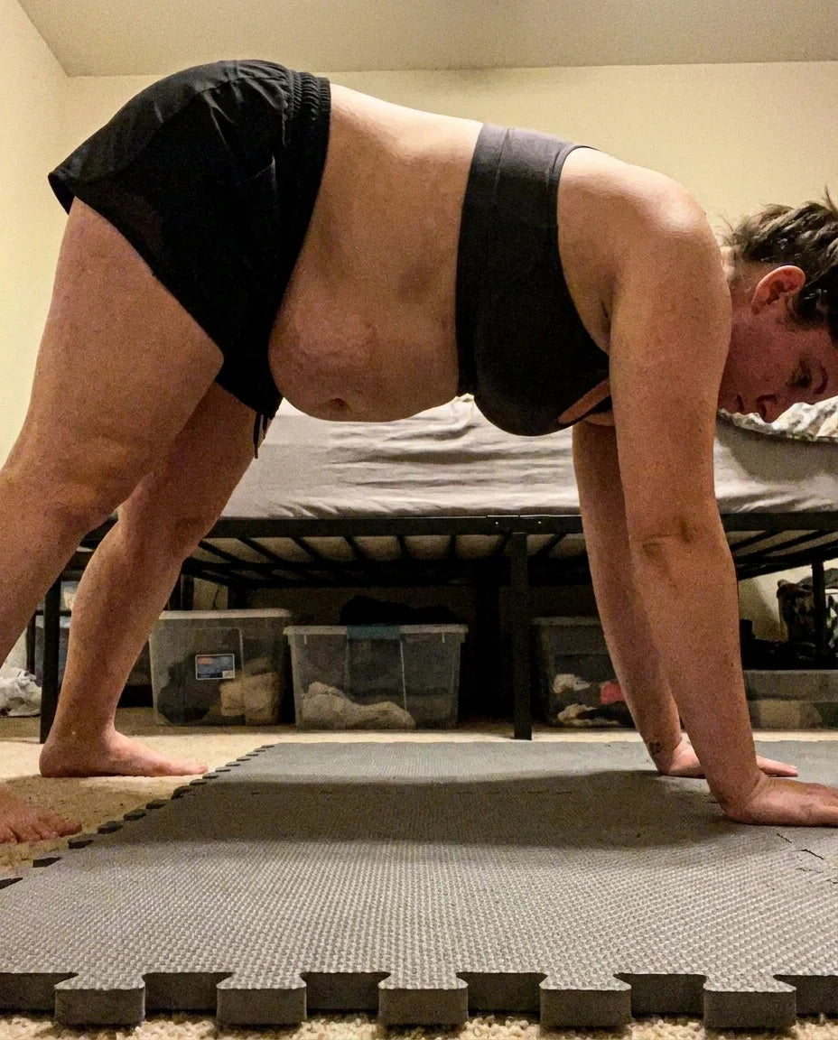 A woman exercising on a yoga mat