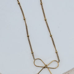 Ivy Dainty Bow Necklace in gold