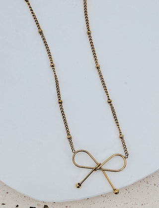 Ivy Dainty Bow Necklace in gold