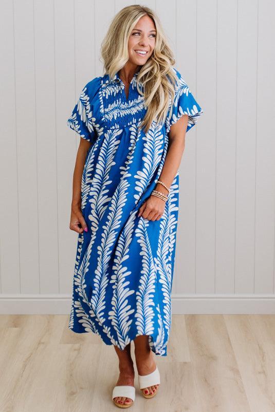 Odette printed smocked midi dress in bright blue