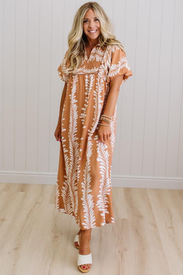 Odette printed smocked midi dress in clay