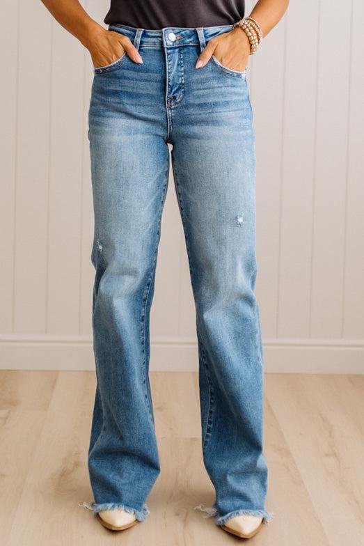 Eleanor High Rise Frayed Hem Jeans in Medium Wash, side view