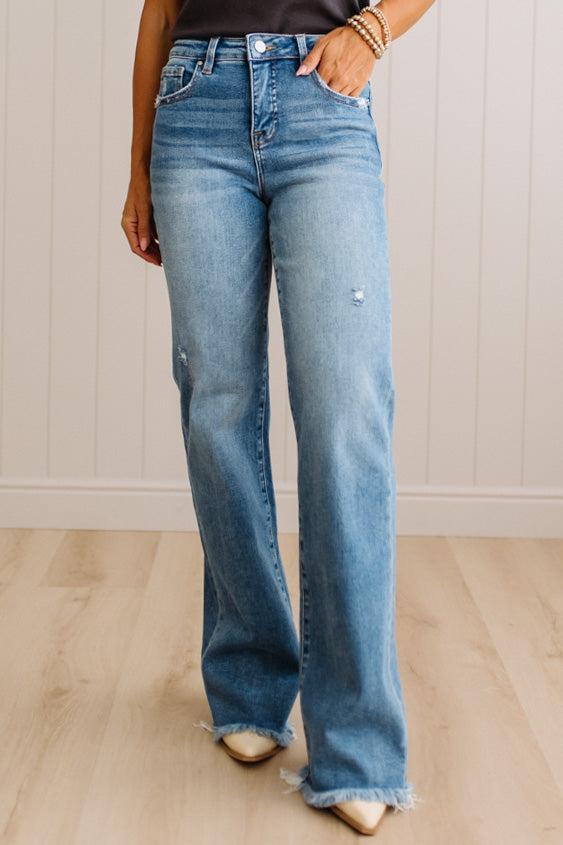 Eleanor High Rise Frayed Hem Jeans in Medium Wash, styled
