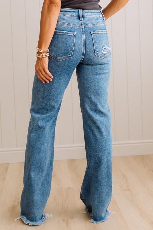 Eleanor High Rise Frayed Hem Jeans in Medium Wash, back view