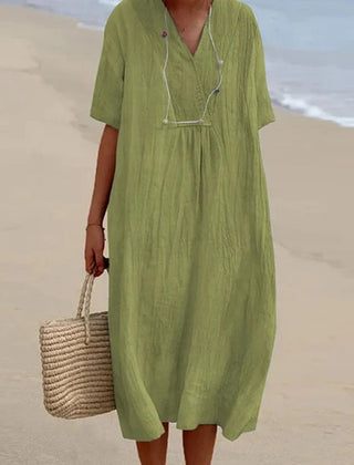 Relaxed V neck midi dress in a light green shade