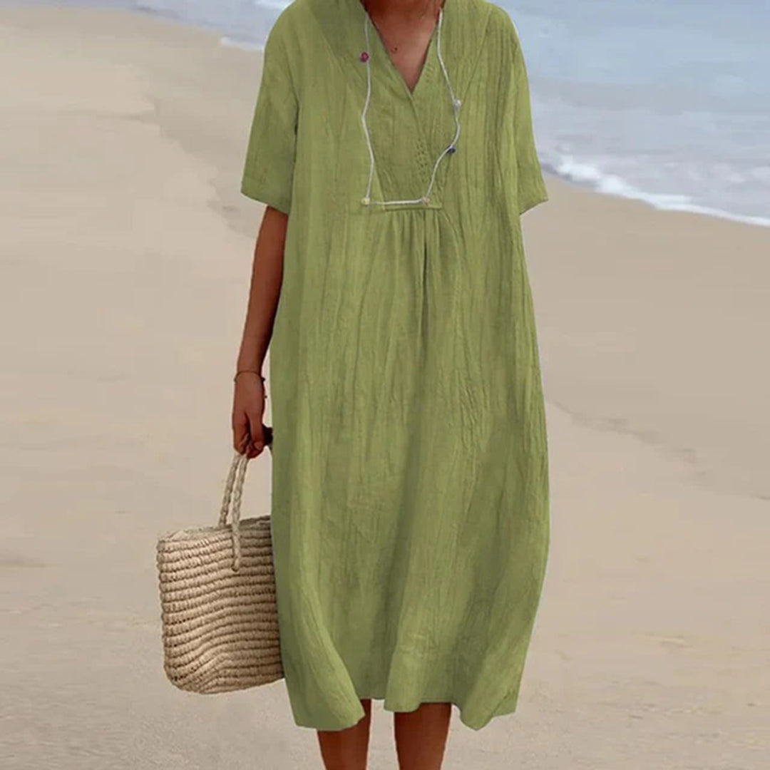 Relaxed V neck midi dress in a light green shade