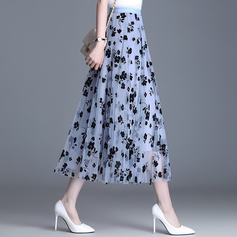 Close view of floral embroidery on the skirt