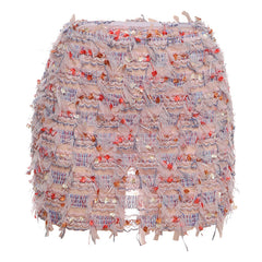 Detail of the high waist on the fringe mini skirt