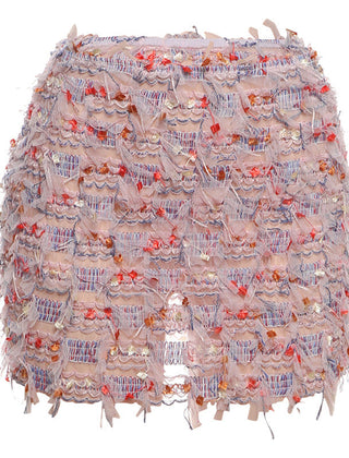 Detail of the high waist on the fringe mini skirt