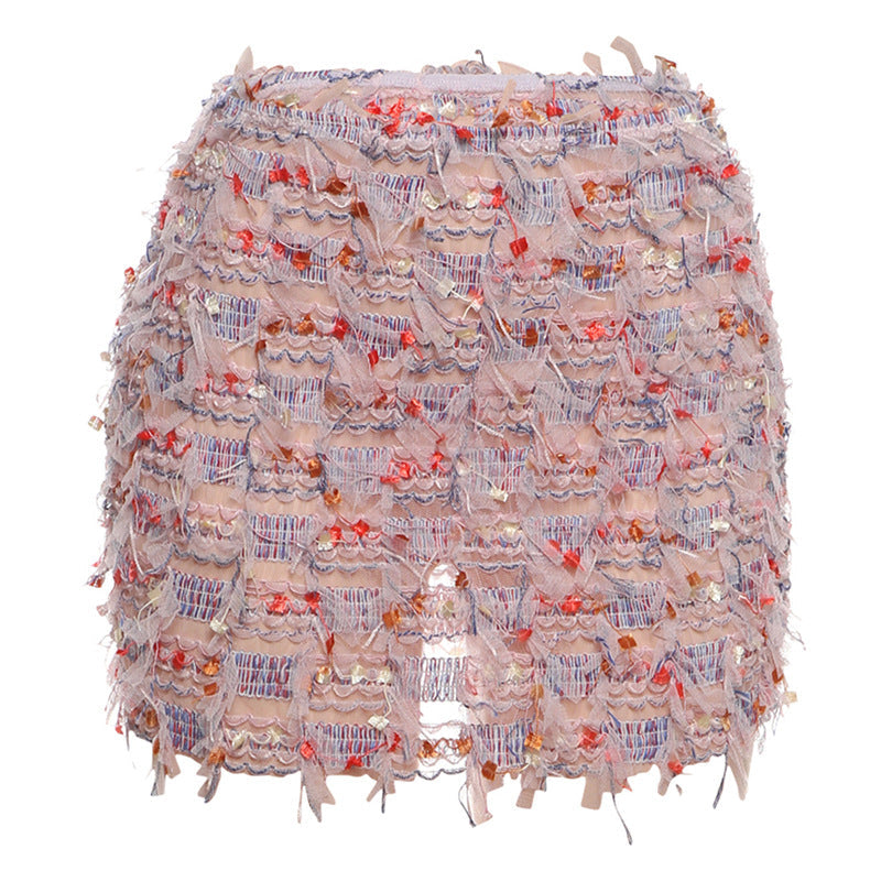 Detail of the high waist on the fringe mini skirt