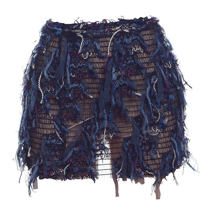 Fringe mini skirt shown styled on model