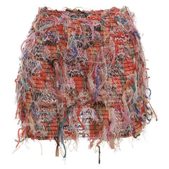 Fringe mini skirt styled with a fitted top