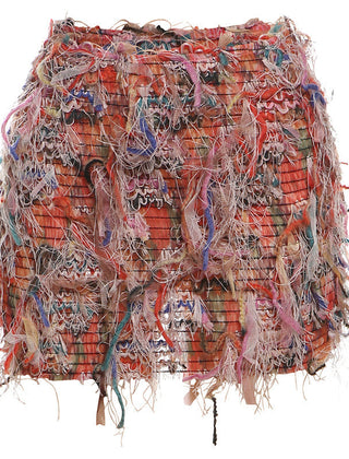 Fringe mini skirt styled with a fitted top