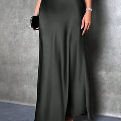 Satin skirt styled with a tucked top
