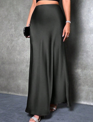 Satin skirt styled with a tucked top