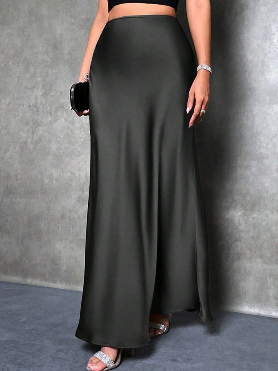 Satin skirt styled with a tucked top