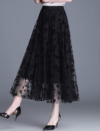 Layered mesh midi skirt styled with a fitted top