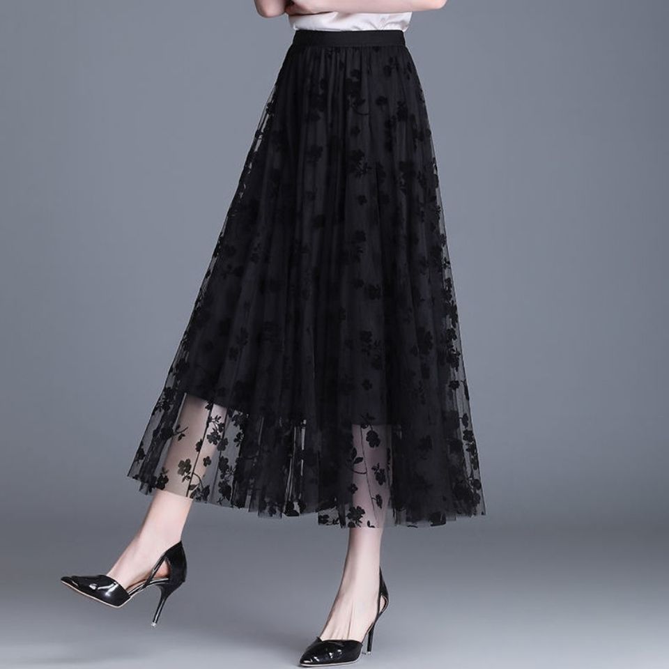 Layered mesh midi skirt styled with a fitted top