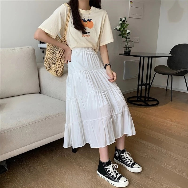 Flowy skirt styled with a casual top