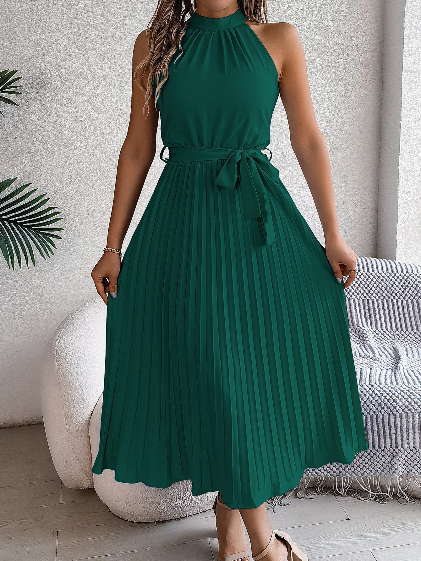 Side view of the pleated midi dress
