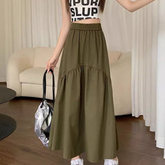 Marjolaine long skirt styled with a casual top