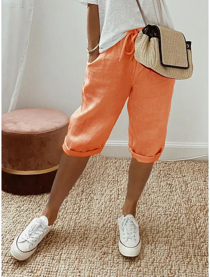 Aleah linen cotton trousers worn with sandals