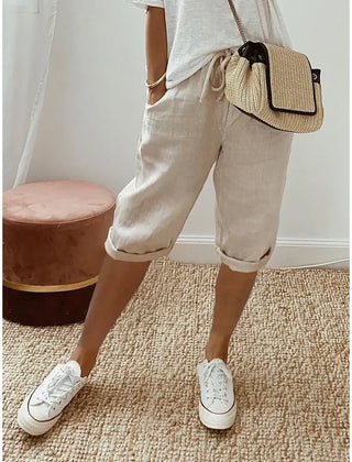 Aleah linen cotton trousers, side view of the relaxed leg