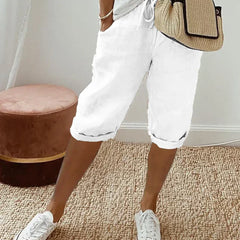 Aleah linen cotton trousers, seated view showing the drape