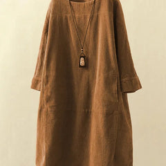 Relaxed fit corduroy dress from the side