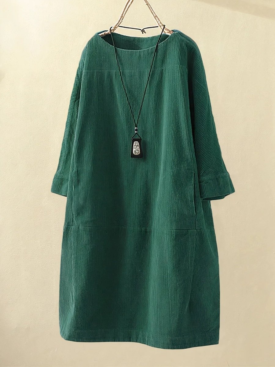 Corduroy midi dress styled with boots