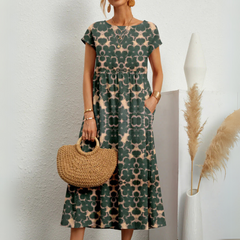 Short sleeve floral midi dress shown from the front