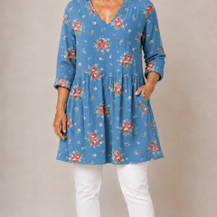 Blue patterned long blouse with V-neck, front view