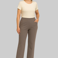 Olivia stretch pants in taupe on a studio background